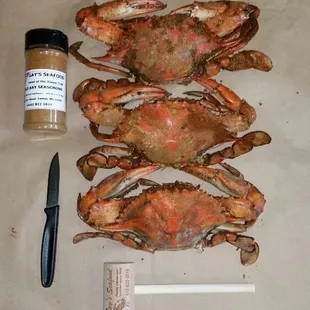three crabs and a knife