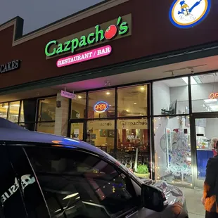 a car parked in front of the store