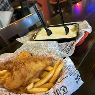 Half cod fish and chips and shepherds pie