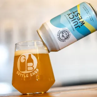 a beer being poured into a glass