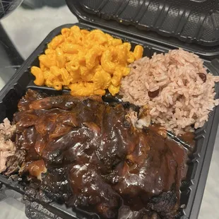 Jamaican Jerk Chicken with Coconut Rice &amp; Peas and Mac &amp; Cheese $11.90