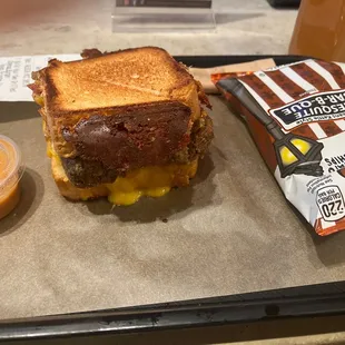 Taking full advantage of being in the office today by enjoying a custom grilled cheese burger.