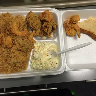 Fried oyster and fried shrimp combo with cole slaw and fried rice with a toast! Taste good