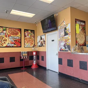 a man sitting on a bench looking at his cell phone
