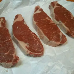 Strip steaks, grass-fed, cut 1.25 - 1.5&quot; thick, $9.29/lb