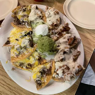 Fajita Steak &amp; Chicken nachos.