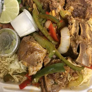 a plate of meat and rice