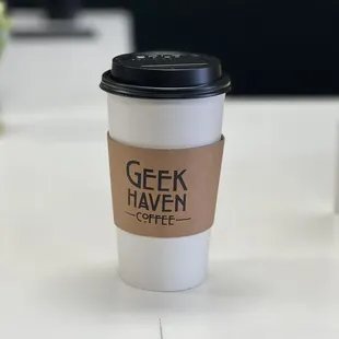 a cup of coffee on a table