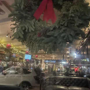 Pic of inside from outside with holiday decor
