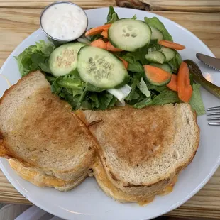 Pimento cheese grilled cheese and side salad.