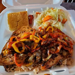 Jerk salmon, rice and peas, and steamed cabbage