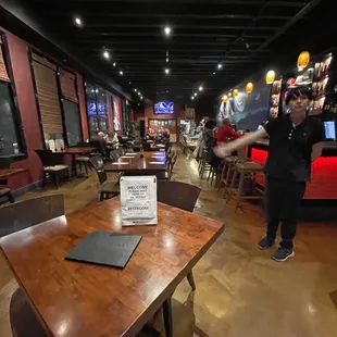 a man standing in a restaurant