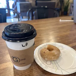 a cup of coffee and a donut