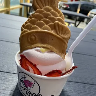 Taiyaki- Strawberry ice cream with custard filling and dried strawberries on top . So amazing.