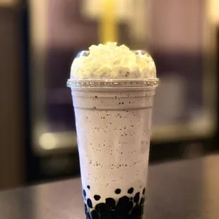 Taro slush with boba and whip cream