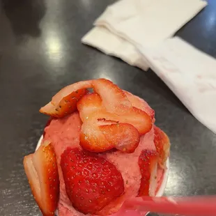 strawberries and ice cream in a bowl