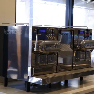 a row of coffee machines