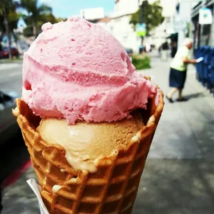 Coffee and strawberry in a waffle cone