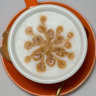 a cup of coffee on a saucer