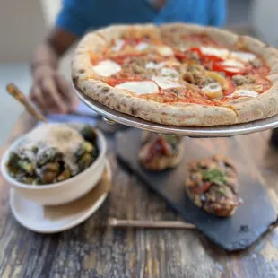San Gennaro Pizza with sausage &amp; peppers, Brussel Sprouts, Eggplant Bruschetta