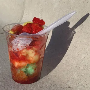 From top to bottom: Cherry, Pineapple, Lime. Chamoy and Tajin, Peach Rings, Gummy Bears for toppings.