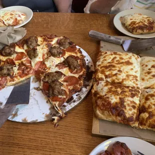 a pizza with a slice missing