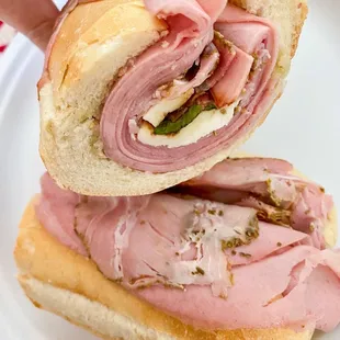 Mortadella, rosemary ham, fresh mozz, basil, EVOO, balsamic glaze, soft roll