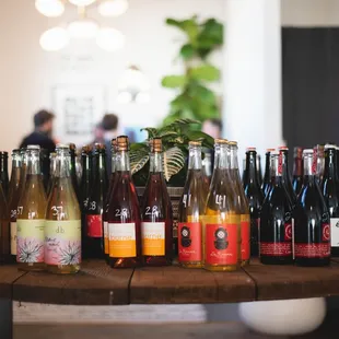a variety of wine bottles on a table