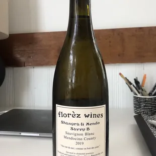 a bottle of wine on a table