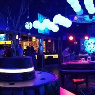 Such a great spot all it is missing is you.   Plenty of seating  and TV at every angle.