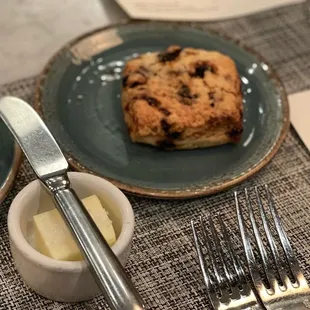 a plate of food and a fork and knife