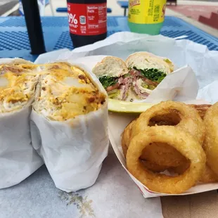 Italian sandwich onion rings and breakfast burrito.