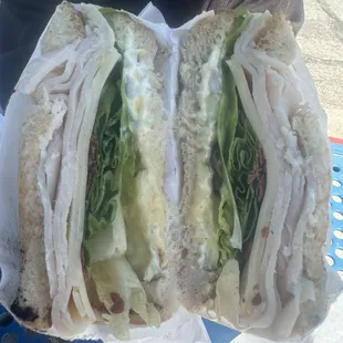 Turkey Swiss sandwich with bacon on sourdough bread