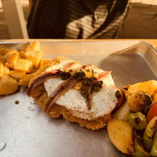 Holstein Schnitzel (veal, anchovy, fried egg, capers)