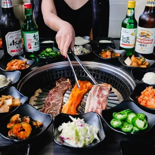a woman preparing a barbecue