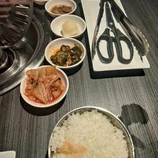 Rice w/side dishes  Kimchee,cucumber kimchee,potatoes dish ,daikon pickle n dikon kimchee strips
