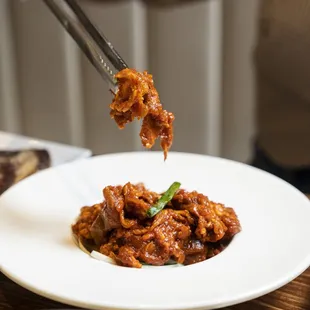 a plate of food being eaten