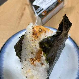 a piece of sushi on a plate