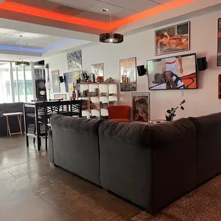 a couch and tables in a restaurant