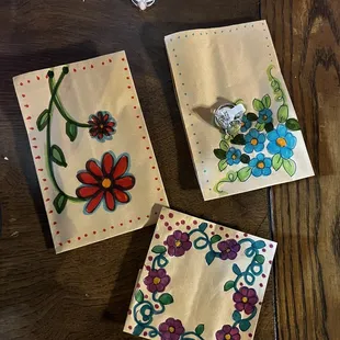 Rings from the gift shop, with hand drawn flowers by Sandy!!