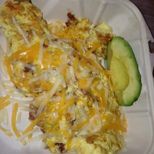 $3 scramble with bacon, avocado, cheese. I'd guess this is 3 eggs worth! Large portion...