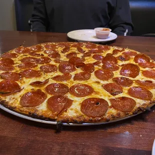 Pepperoni, extra cheese thin crust pizza