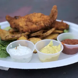 Fried chicken with home made potatoes and three scrumptious sauces.