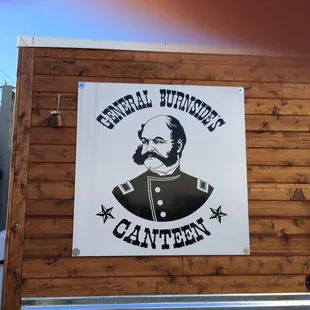 a sign on the side of a building