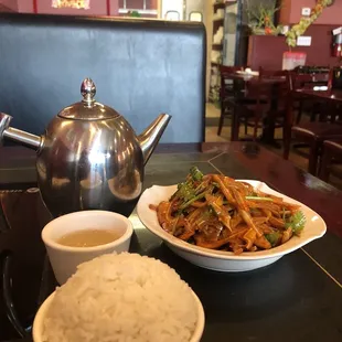 Comped tea with rice, pig ear slice in red chili oil (9.99)