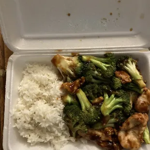 chicken and broccoli in a styrofoam container
