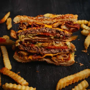 a stack of french fries and a cheeseburger