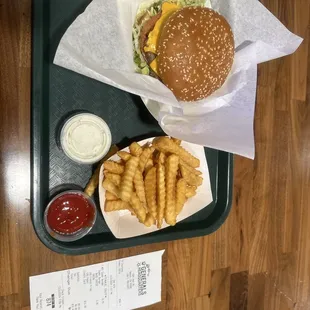 In this photo there is a Super Burger Combo Meal!