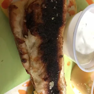 a piece of grilled meat on a plate