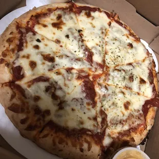 a cheese pizza in a box